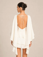 Eliza Cape mit Schleife hinten und Stufenrock Minikleid
