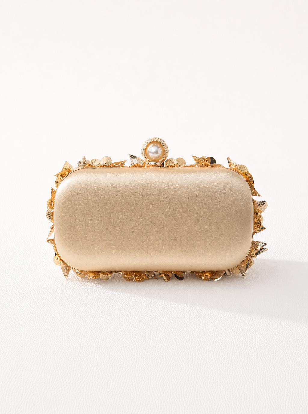 Zephrina structured evening bag in gold